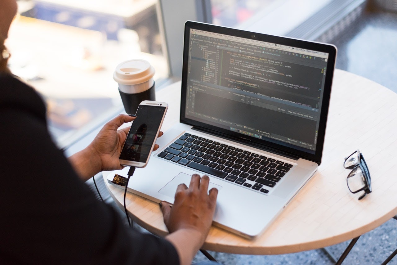 woman-coding-in-cafe-in-demand-skills