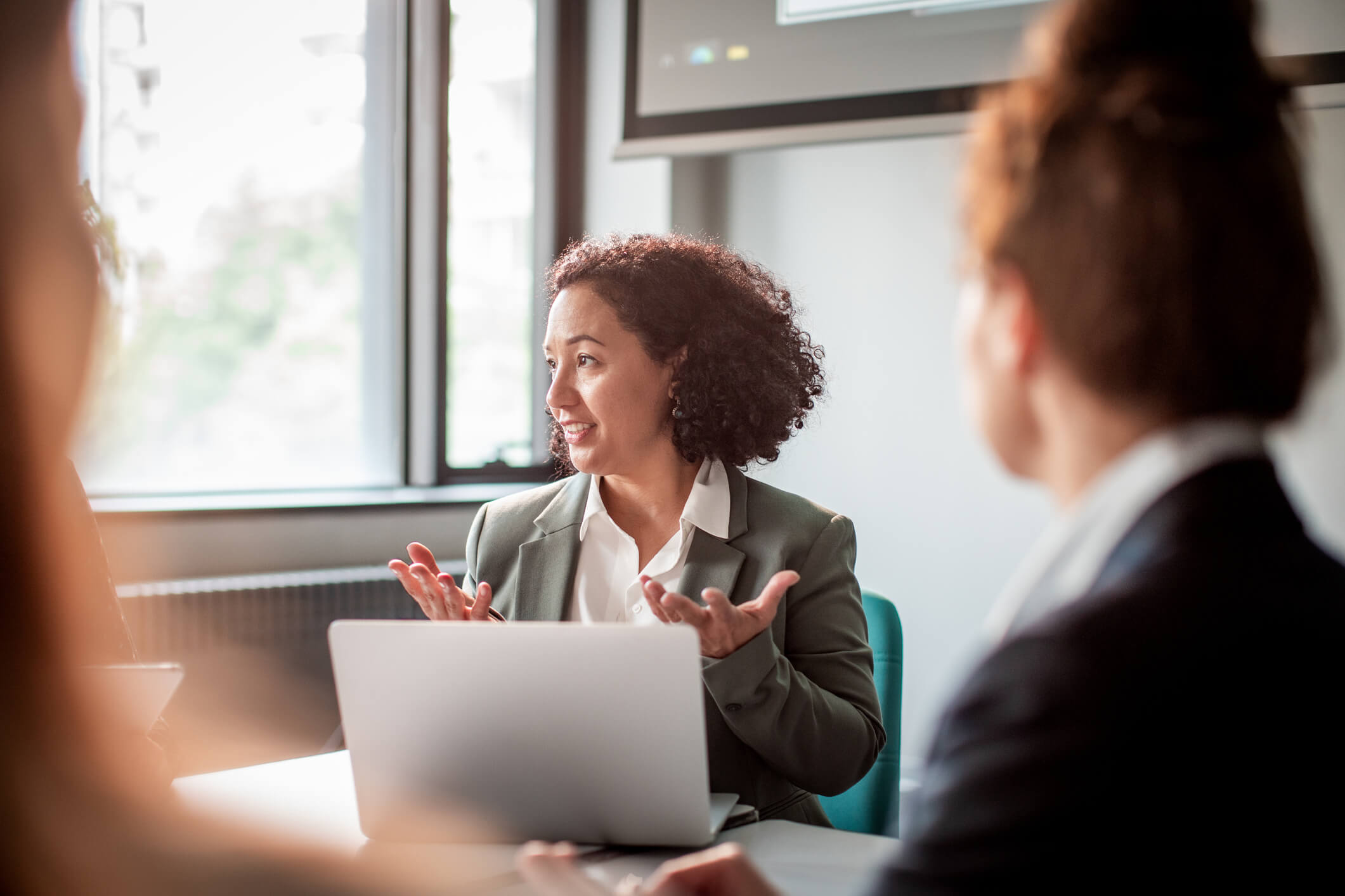 woman leading meeting about leadership development