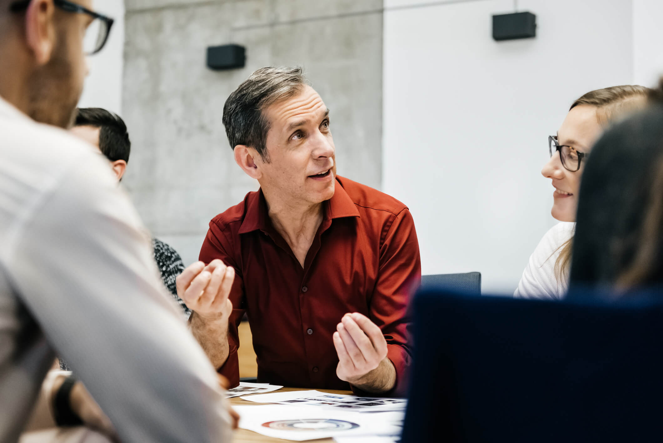 man leading a meeting about leadership development