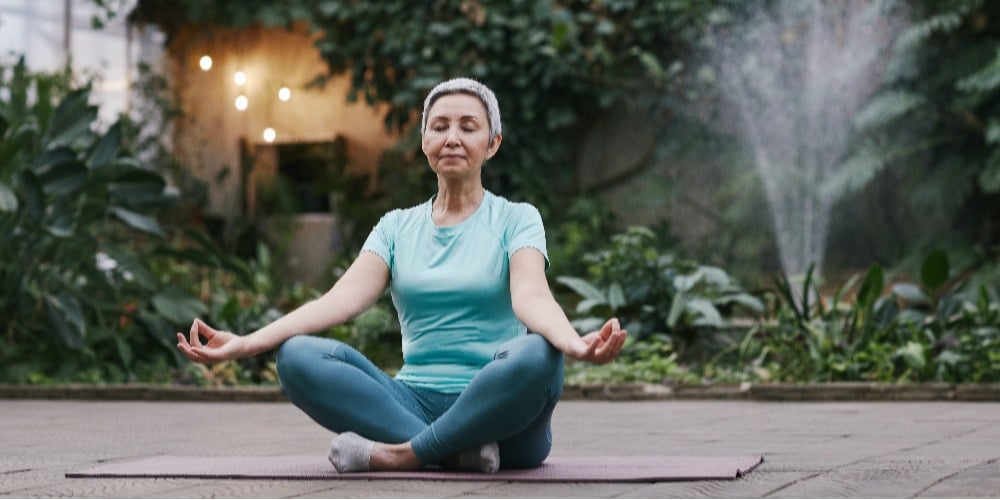 woman-meditating-improve-employee-well-being-for-better-performance