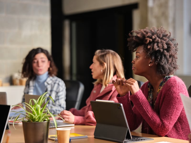 three-woman-in-a-work-meeting-personal-goals