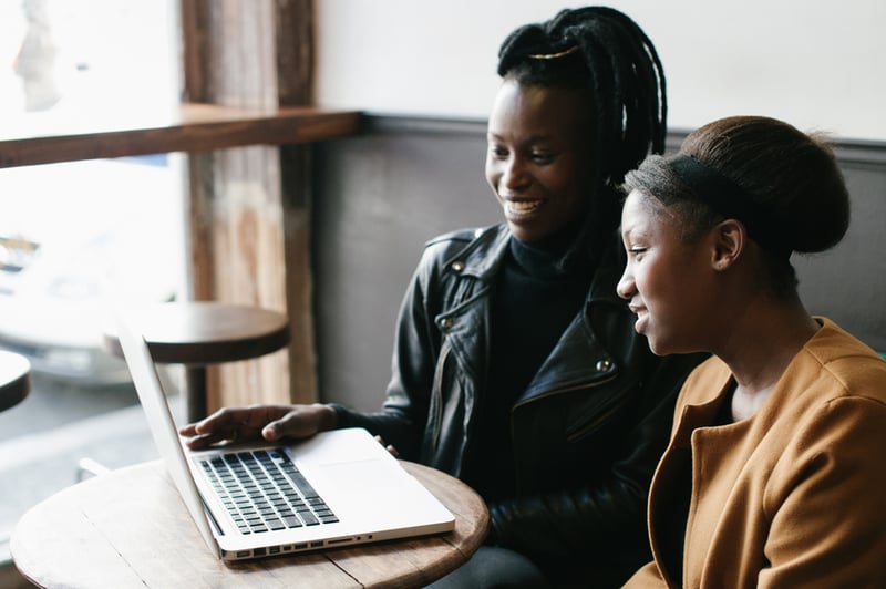 woman-mentoring-another-woman-in-cafe-personal-goals